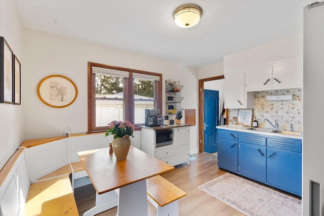 dining area with light wood finished floors