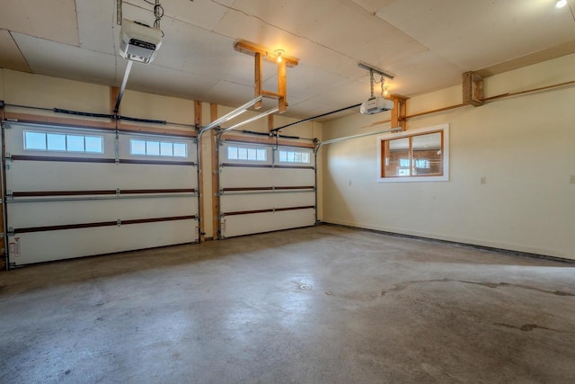 garage featuring a garage door opener