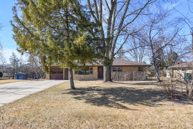 view of front facade featuring a garage, stone siding, and concrete driveway