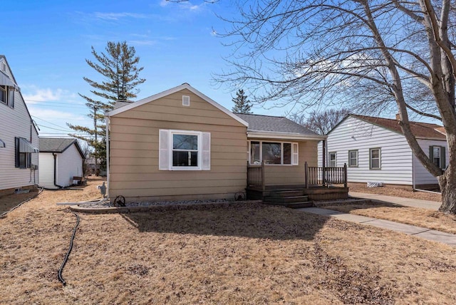 view of front of house featuring roof with shingles