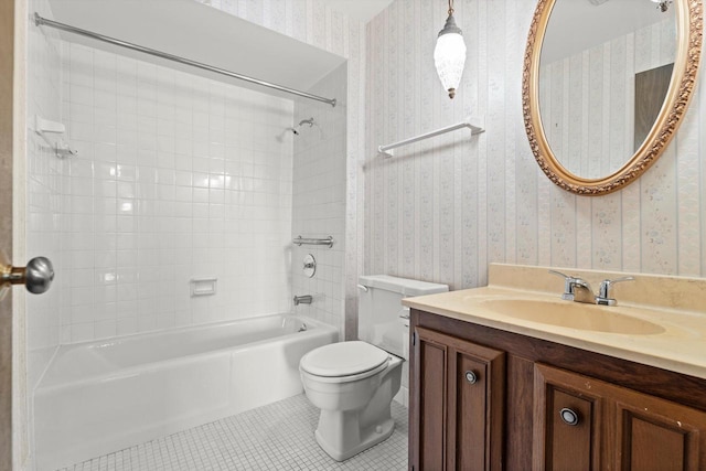 bathroom featuring tile patterned floors, toilet,  shower combination, and wallpapered walls