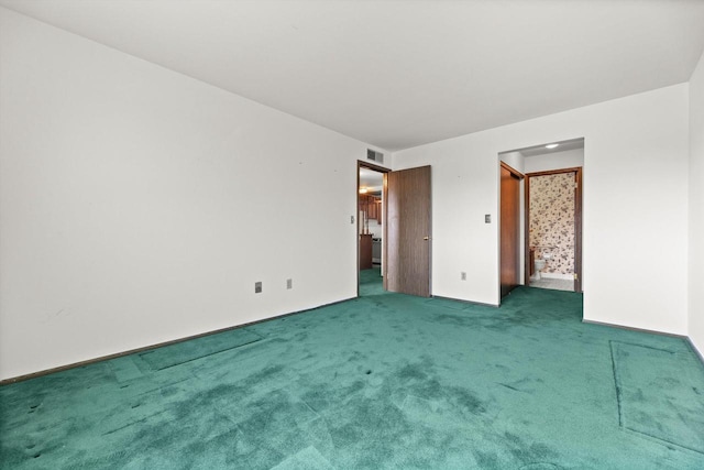 unfurnished bedroom with carpet flooring and visible vents