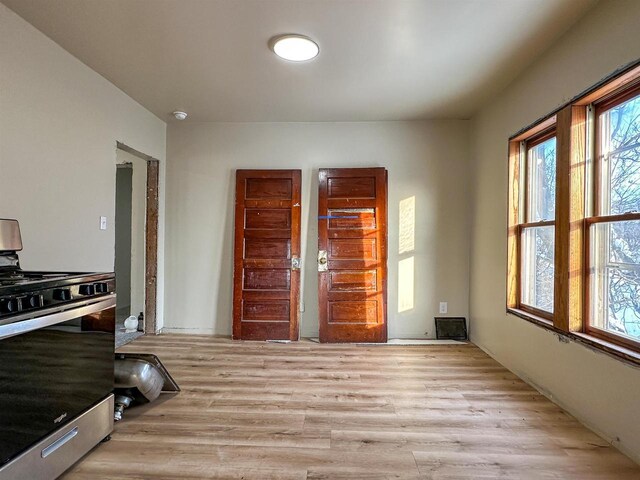 entrance foyer with light wood-style flooring