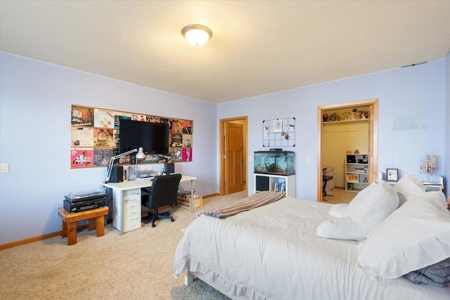 bedroom featuring baseboards and carpet flooring