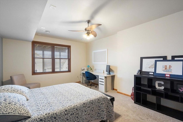 bedroom featuring light carpet, ceiling fan, and baseboards