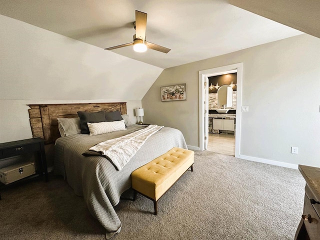 carpeted bedroom featuring lofted ceiling, a ceiling fan, and baseboards