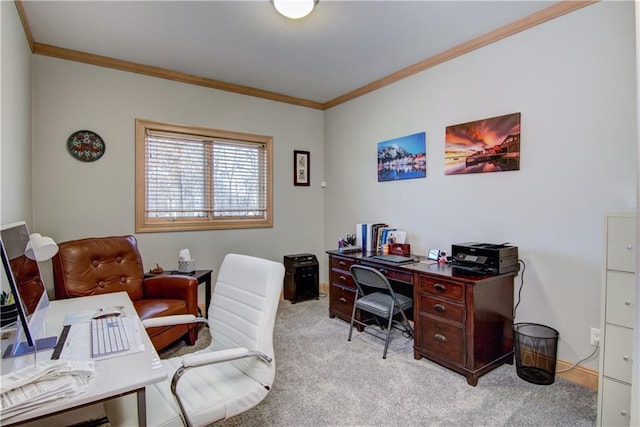 office area with carpet floors, baseboards, and ornamental molding