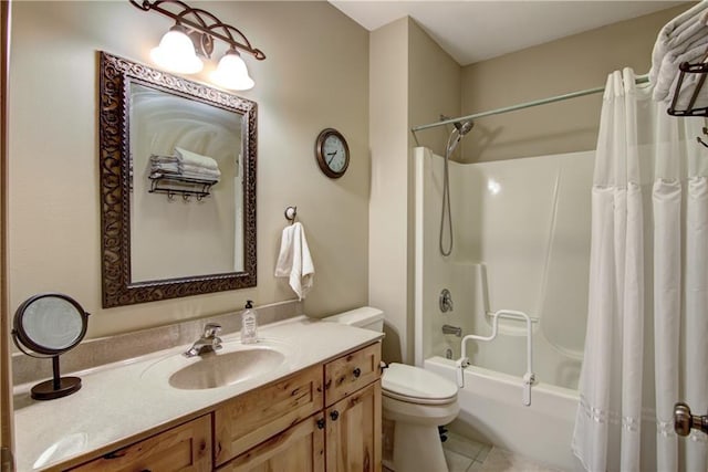 bathroom with tile patterned flooring, toilet, vanity, and shower / bath combo with shower curtain