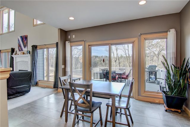 dining room with recessed lighting