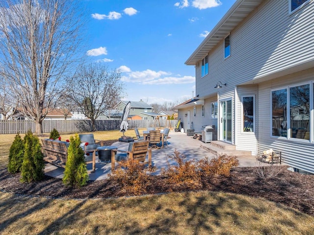 view of yard featuring a patio area and fence