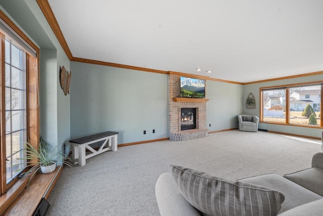 living area featuring carpet flooring, a brick fireplace, baseboards, and ornamental molding