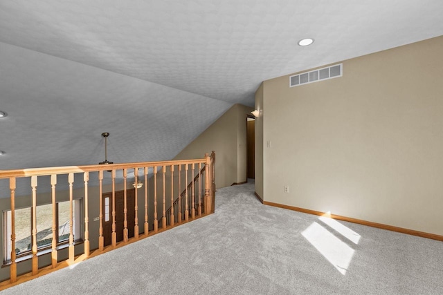 bonus room with visible vents, recessed lighting, carpet floors, baseboards, and vaulted ceiling