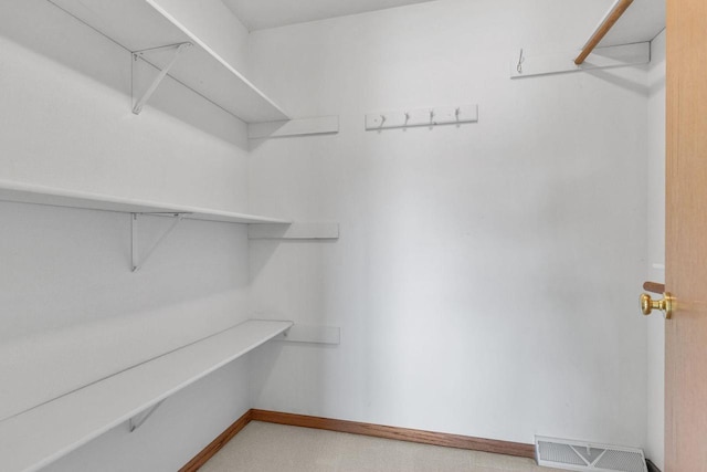 walk in closet featuring visible vents