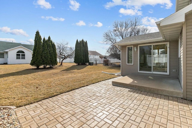 view of patio / terrace featuring fence