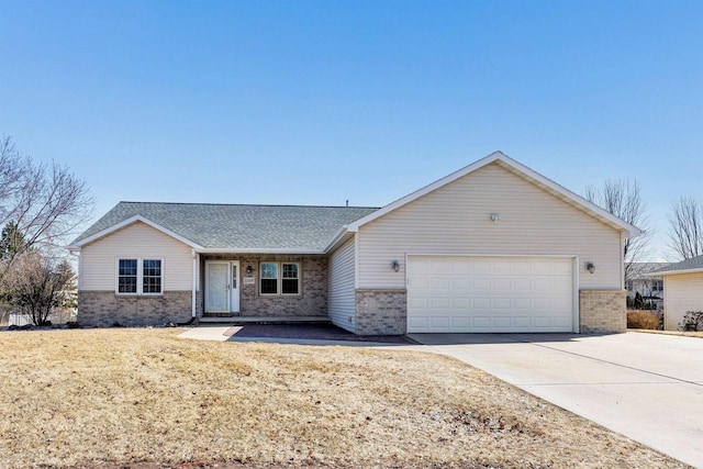 ranch-style home featuring brick siding, an attached garage, driveway, and roof with shingles