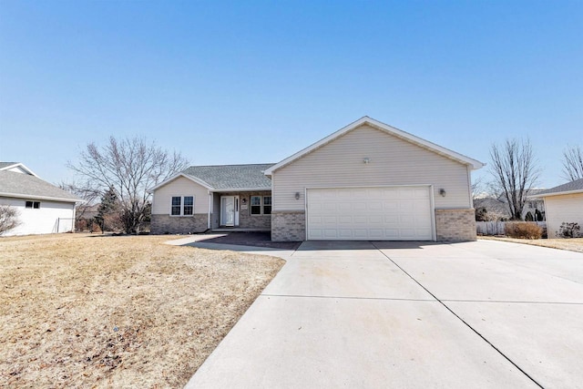 ranch-style house with brick siding, an attached garage, concrete driveway, and fence