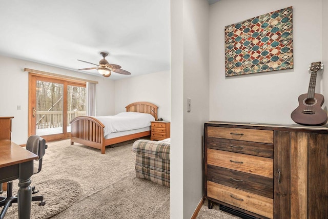 bedroom featuring baseboards, carpet floors, ceiling fan, and access to outside