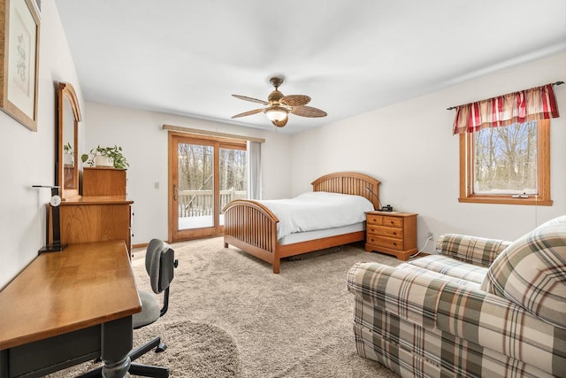 bedroom with carpet floors, a ceiling fan, and access to outside