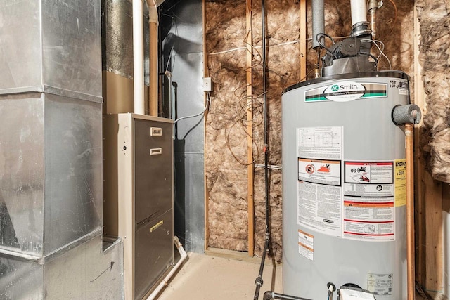 utility room featuring gas water heater and heating unit