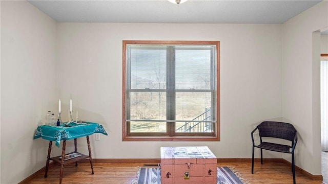 interior space with light wood-style flooring and baseboards