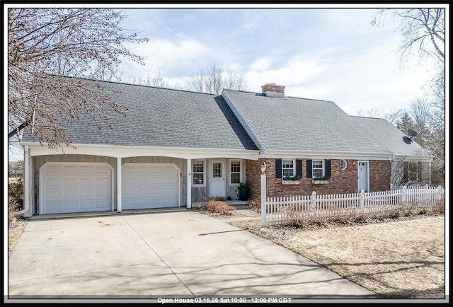 view of front of house with fence, concrete driveway, a garage, brick siding, and a chimney