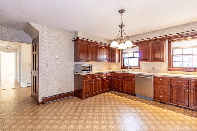 kitchen featuring a sink, stainless steel appliances, light floors, and light countertops