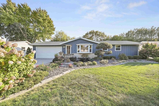 single story home featuring a garage, driveway, brick siding, and a front lawn