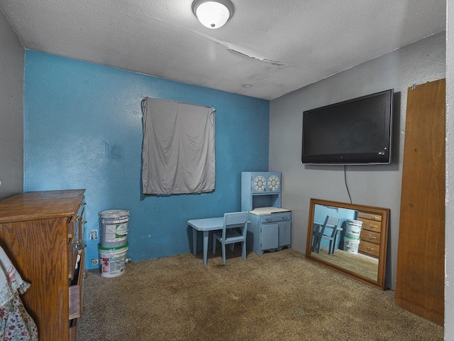 interior space featuring a textured ceiling