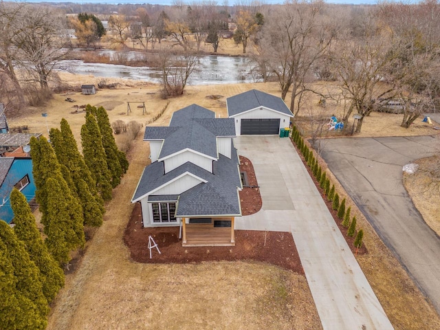 birds eye view of property featuring a water view