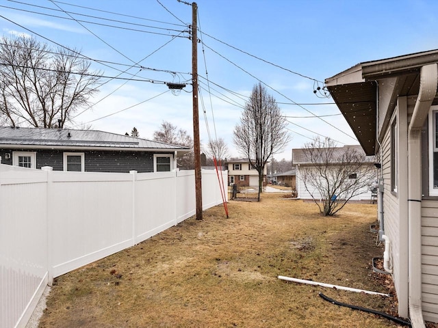 view of yard featuring fence