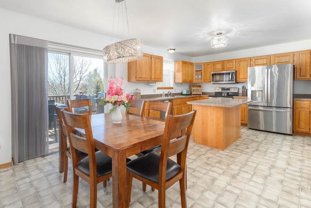 dining room featuring light floors