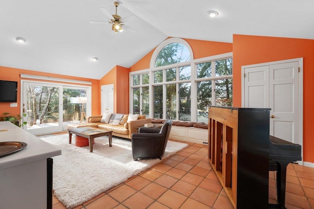 1914 Eastwood Ave, Janesville, WI 53545 - living room featuring light tile patterned floors, ceiling fan, and vaulted ceiling