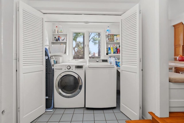 1914 Eastwood Ave, Janesville, WI 53545 - laundry area with laundry area, light tile patterned floors, and separate washer and dryer
