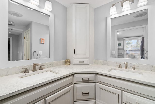 1914 Eastwood Ave, Janesville, WI 53545 - full bath featuring double vanity and a sink