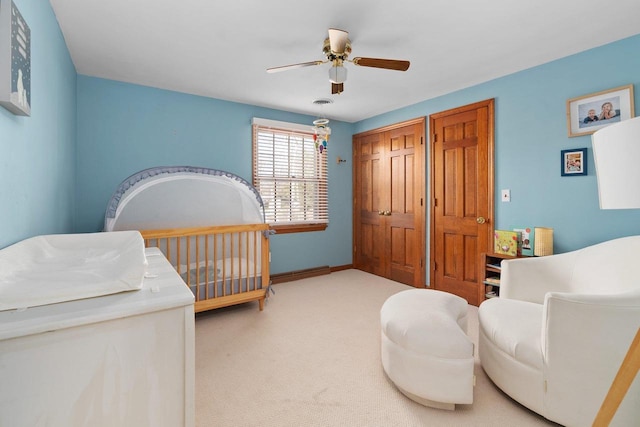 1914 Eastwood Ave, Janesville, WI 53545 - bedroom with ceiling fan, baseboards, and carpet