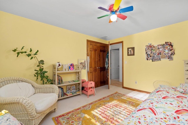 1914 Eastwood Ave, Janesville, WI 53545 - bedroom with baseboards, ceiling fan, and carpet flooring