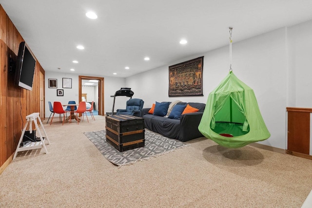 1914 Eastwood Ave, Janesville, WI 53545 - carpeted living area with wooden walls and recessed lighting