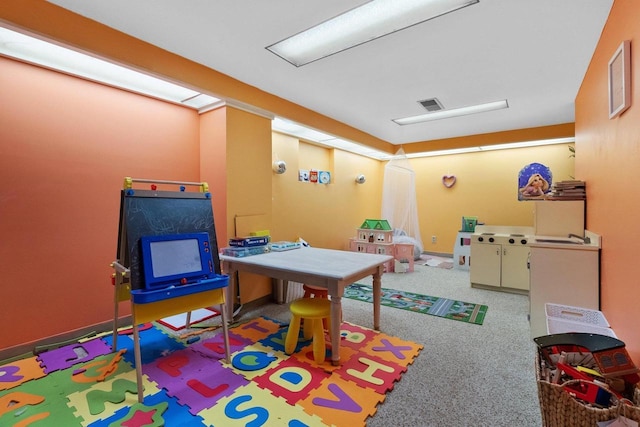 1914 Eastwood Ave, Janesville, WI 53545 - playroom with visible vents and carpet floors