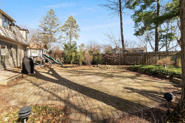 1914 Eastwood Ave, Janesville, WI 53545 - exterior space with a playground and fence
