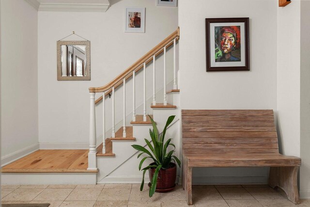 1914 Eastwood Ave, Janesville, WI 53545 - stairs with baseboards and ornamental molding