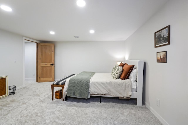 bedroom featuring recessed lighting, baseboards, and carpet floors