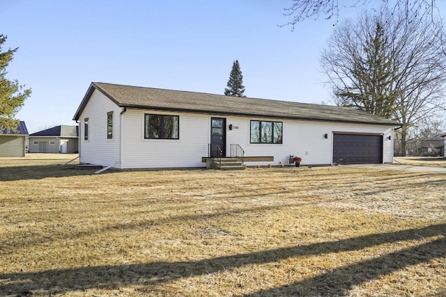 single story home featuring a garage