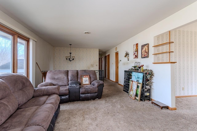 living room featuring visible vents, baseboards, carpet flooring, and wallpapered walls