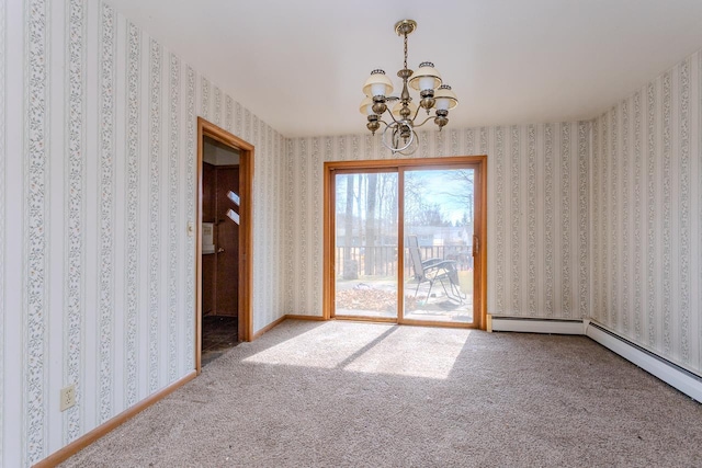 carpeted spare room with wallpapered walls, baseboards, a baseboard heating unit, and a chandelier