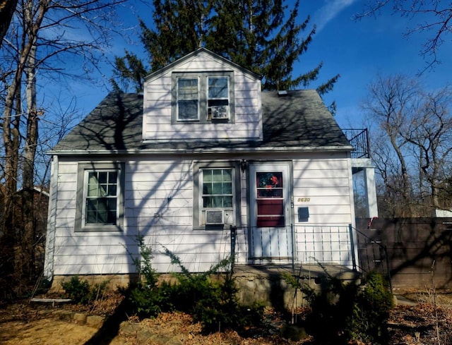 view of front of property featuring cooling unit