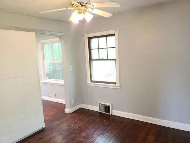 8630 W Lancaster Ave, Milwaukee, WI 53225 - unfurnished room with wood-type flooring, a ceiling fan, and baseboards