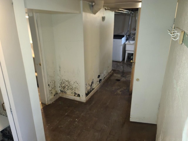 8630 W Lancaster Ave, Milwaukee, WI 53225 - hall with washer / dryer and concrete floors