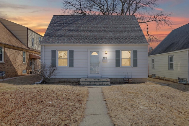 view of front of home with roof with shingles