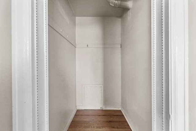 spacious closet with wood finished floors