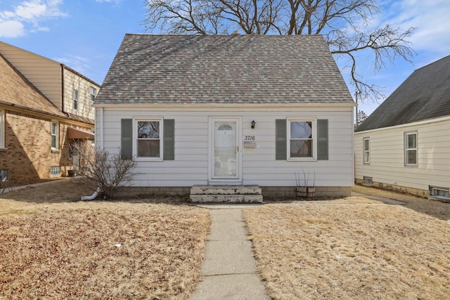 view of front of home with roof with shingles